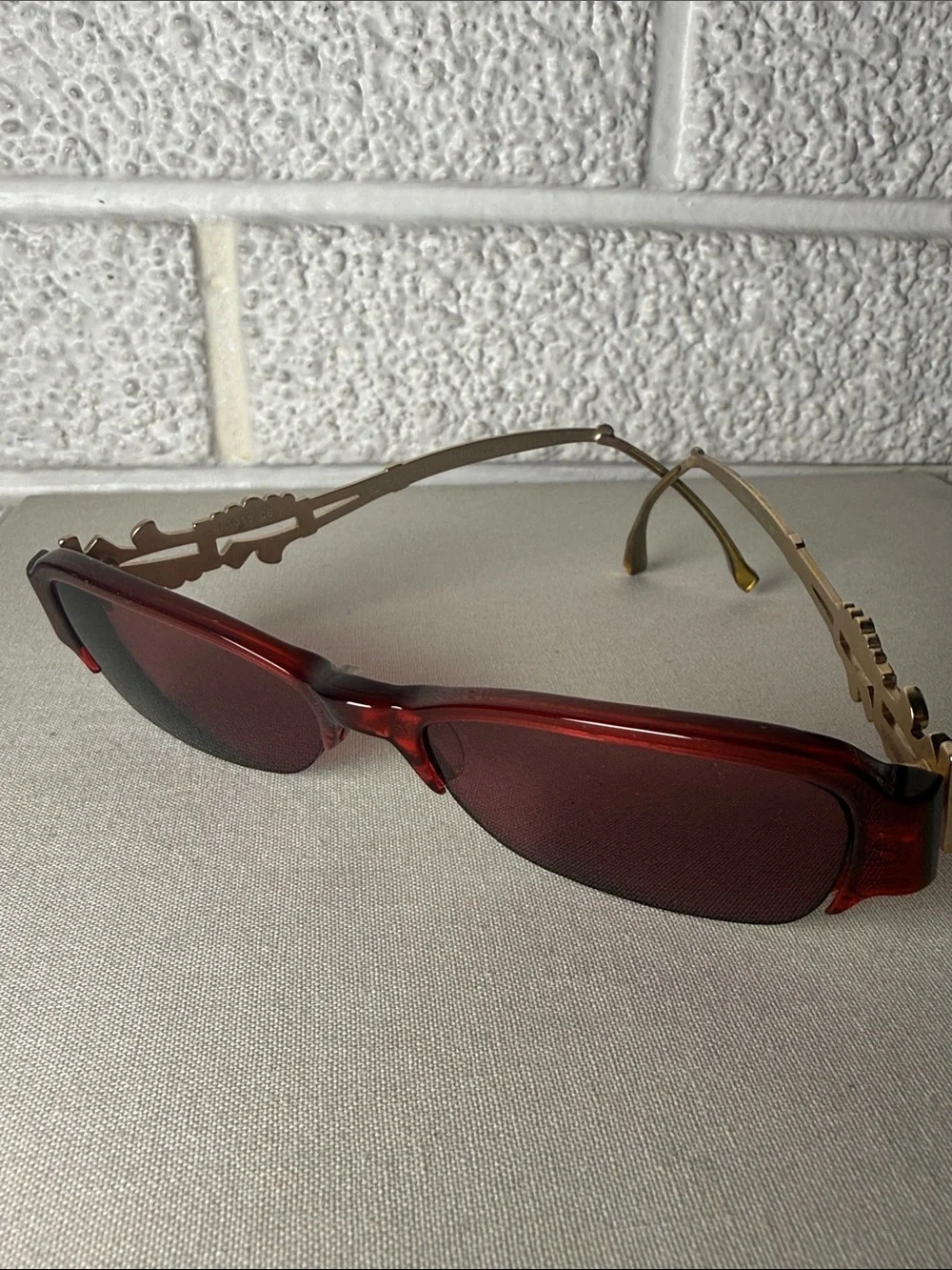 Judith Leiber Red Rectangular Frames with Decorative Metal Temples